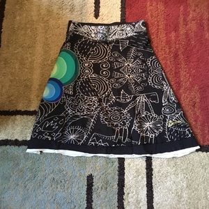 Desigual a-line skirt . Blk w pops of color SMALL
